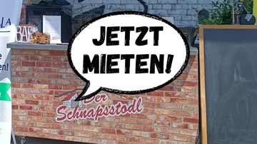Backstein-Bar mit 'Jetzt Mieten! ' Textzeichen.