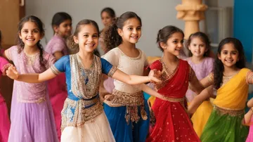 Girls in colorful clothes dance together in a room.