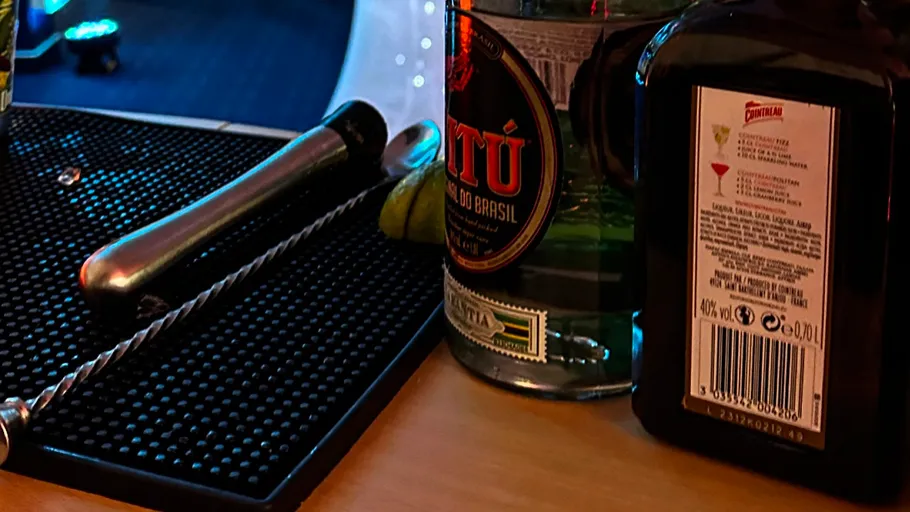 Bar tools and bottles on counter