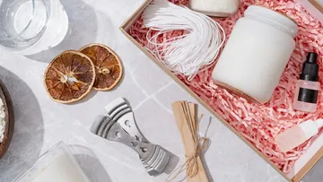Candle making kit with jar and tools.