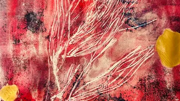 Abstract red and yellow artwork with white lines.