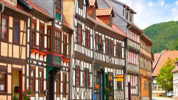 Colorful half-timbered buildings on a quaint street.