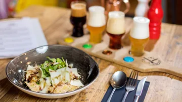 Risotto with cheese and mixed beer flight.