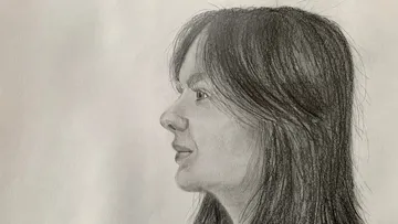 Pencil sketch of woman's profile with long hair.