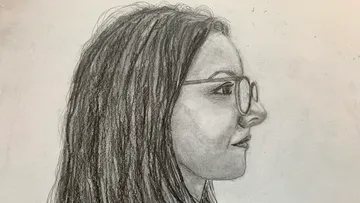 Profile sketch of woman with glasses.