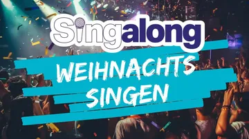 Singalong Weihnachtsgesangsveranstaltung, lebhaftes Publikum.