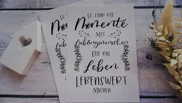 Decorative German quote on a card.