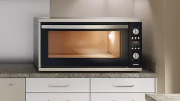 Microwave oven on a kitchen counter.