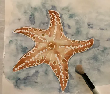 Starfish painting with brush on canvas.