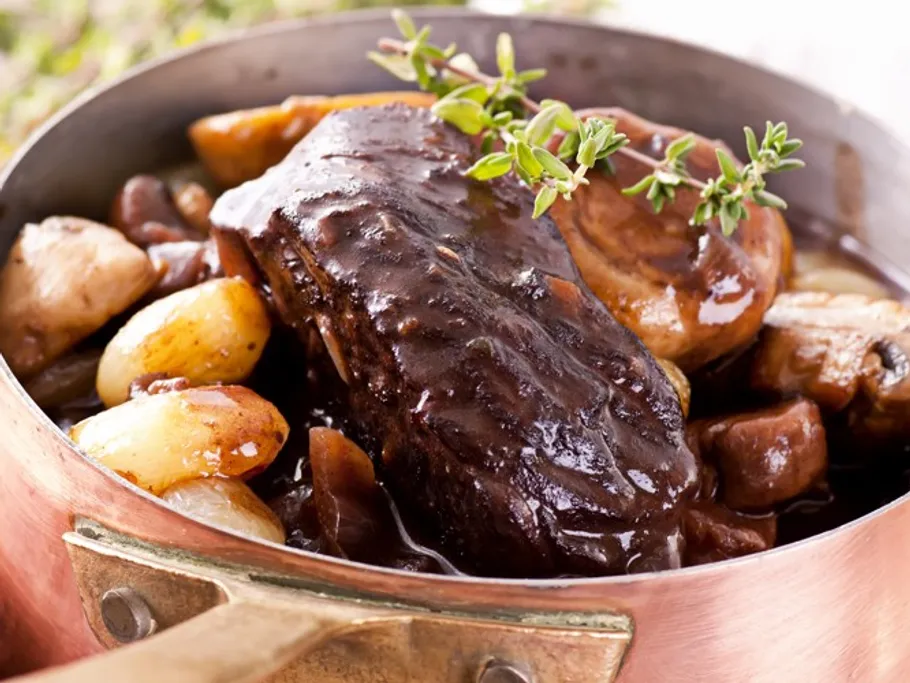 A stew with meat and vegetables in a pot.