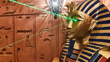 Pharaoh statue with green laser eyes