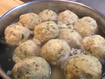 Cook dumplings in a pot of water.