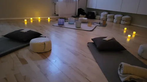 Meditation room with cushions and candles