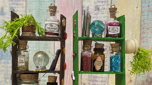 Mini shelves with colorful potion bottles.