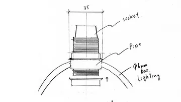 Hand-drawn mechanical design sketch with measurements.