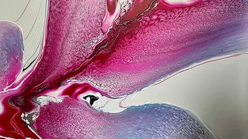 Abstract artwork with red and purple swirls.