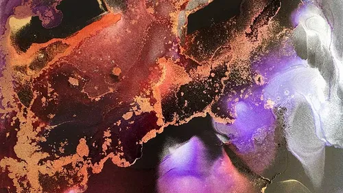 Abstract art with vivid purple and orange swirls.