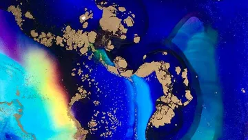 Abstract art with blue, gold, and rainbow colors.