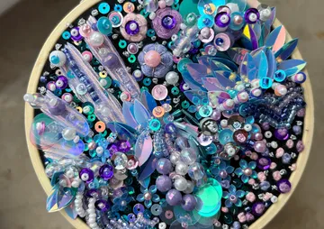Colorful sequins and beads embroidery art.