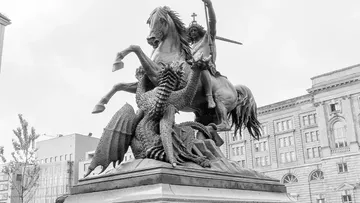 Equestrian statue depicting dragon slaying