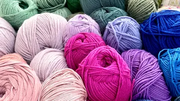 Colorful yarn skeins in various hues.