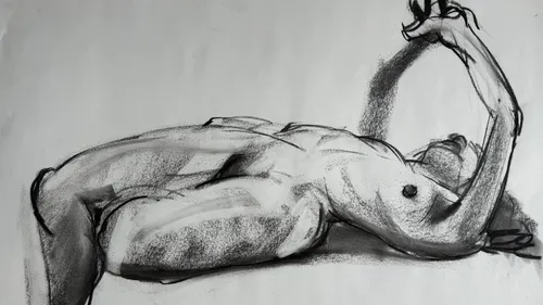 Charcoal drawing of reclining figure.