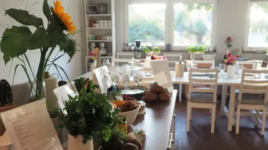 Dining area with decor and various foods.