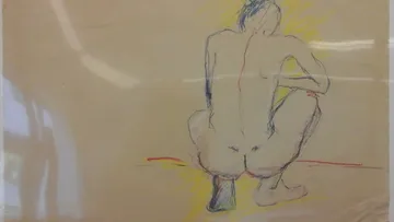 Sketch of crouching figure on beige paper.