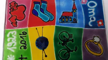 Colorful patchwork with objects and text.
