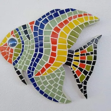 Colorful fish mosaic on white background.