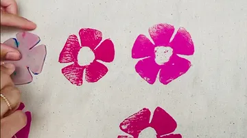 Pink flower stamps on fabric.