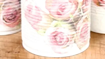 Decorated cans with pink roses