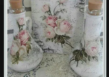 Decorative bottles and artwork with rose motifs.