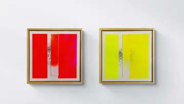 Two abstract paintings with red and yellow hues.