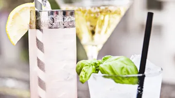 Three cocktails, one with basil and ice.