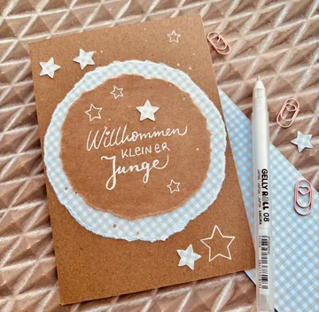 Grußkarte mit dem Text 'Willkommen kleiner Junge'.