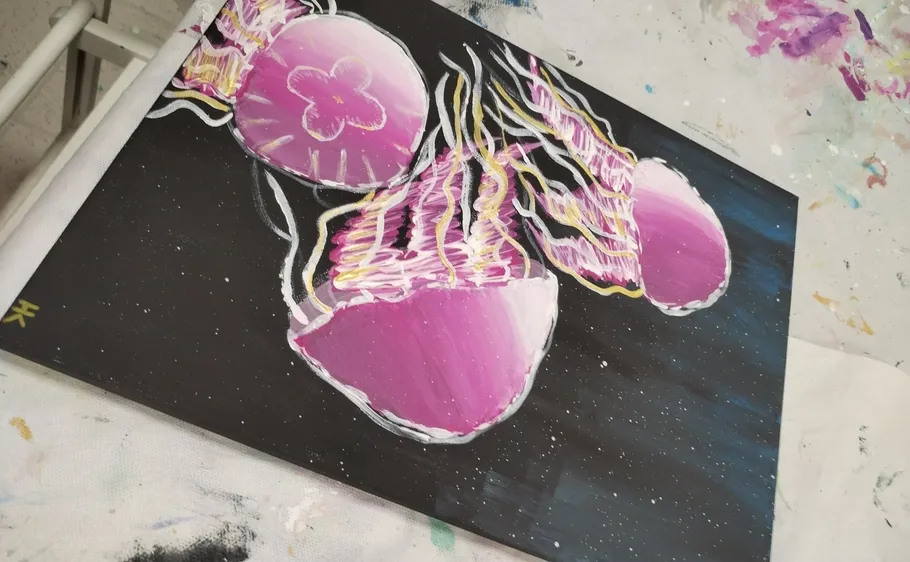 Painting of three pink jellyfish with white outlines.