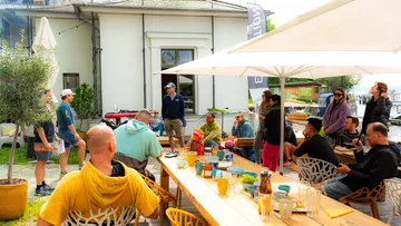 Group gathered outdoors for a casual meeting