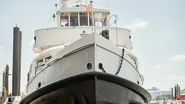 Large boat docked in a harbor