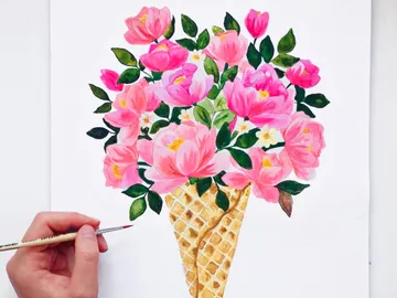 Ice cone with colorful flowers is painted with a brush.