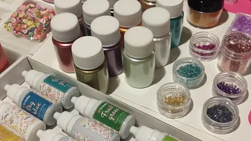 Assorted craft supplies on a table.