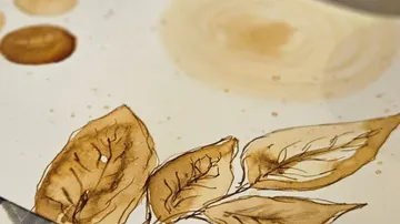 Watercolor painting of brown leaves on paper.