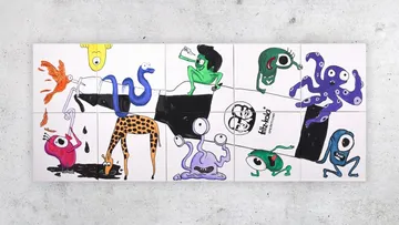 Colorful monsters on tiled artwork display.