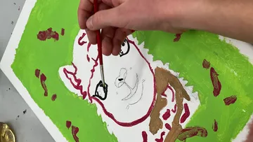 Handbemalung von Alpaka auf grüner Leinwand.