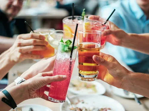 Drinks are initiated by several people, cheerful atmosphere.