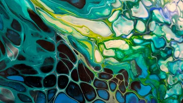 Abstrakte flüssige Kunst mit blauen und grünen Farben.