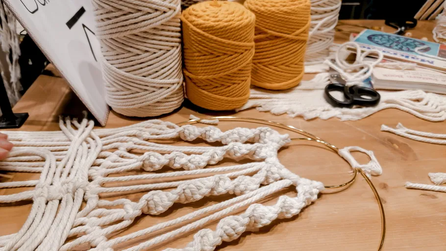 Cord is knotted to create a wall decor.