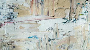 Abstract painting with thick textured paint.