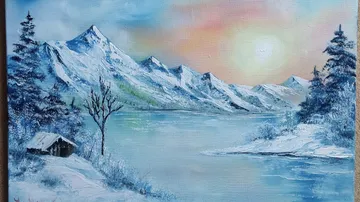 Snowy mountains reflected in a serene icy lake.