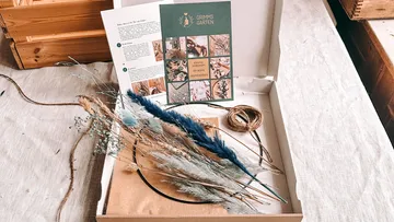 Craft kit with dried flowers, instruction card.